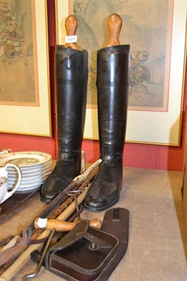 Lot 1624 - Pair of riding boots and trees, two boot pulls, two antler handled crops, three riding sticks...