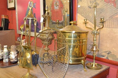 Lot 1626 - A brass table lamp on paw feet, height 59cm, brass coal box, pair of brass candlesticks and a...