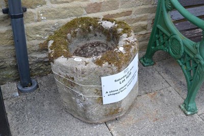 Lot 1639 - A stone planter of octagonal shaped form, height 52cm