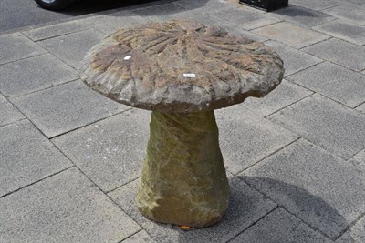 Lot 1645 - A large carved staddle stone, diameter 83cm