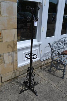 Lot 1648 - A wrought iron stick stand, 157.5cm high