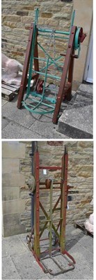 Lot 1659 - Two sack lifts (hoists), both with winding handles, one made by John Cooke & Sons, Lincoln