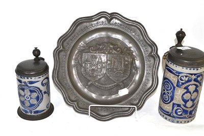 Lot 25 - Two German stoneware tankards with pewter mounts inscribed to the cover and dated 1757 and 1781 and