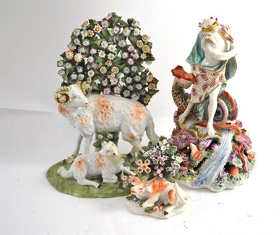 Lot 36 - A Derby figure, Staffordshire flower encrusted figure group and a small Staffordshire figure group