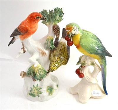 Lot 64 - Meissen 'Birds in Branches' and a pottery parrot