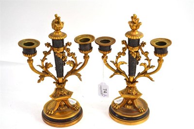 Lot 74 - A pair of 19th century two light candelabra in ormolu and simulated porphyry