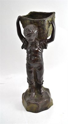 Lot 81 - Bronze of a boy carrying a basket, 42cm high
