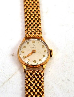 Lot 96 - A lady's 9ct gold wristwatch signed Omega, attached with a later associated 9ct gold bracelet