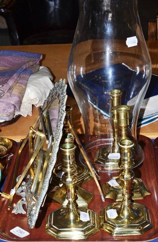 Lot 290 - A set of four brass candlesticks, two odd brass candlesticks and shade, a brass fan shaped...