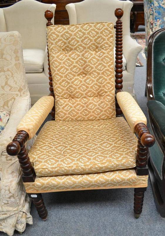 Lot 640 - A 19th century bobbin turned armchair, 60cm wide