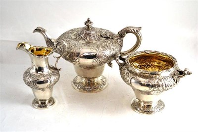 Lot 8 - A Victorian silver three piece tea service, Edinburgh 1848, maker's mark M&S, each finely...