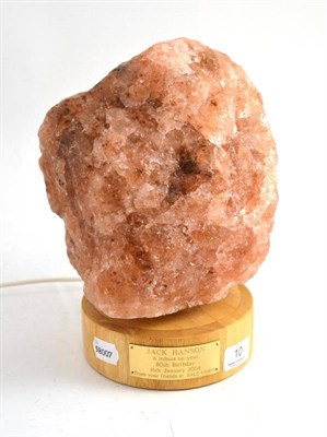 Lot 10 - A rock salt lamp with presentation plaque to the base