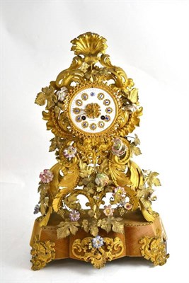 Lot 14 - A 19th century French gilt metal and flower encrusted mantel clock