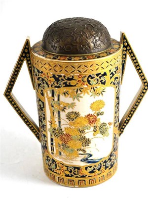 Lot 18 - A Japanese earthenware vase and metal cover
