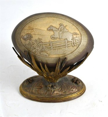 Lot 25 - A cameo engraved Emu egg with Emu hunting scene with gilt metal stand