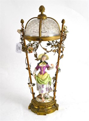 Lot 35 - A china figure of a lady with gilt metal base and cut glass shade