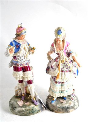 Lot 60 - A pair of French porcelain figures of a lady and a gentleman