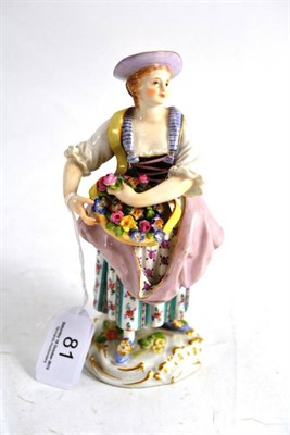Lot 81 - Meissen figure of a girl with a flower basket