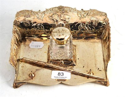 Lot 83 - Silver inkstand dish decorated with cherubs