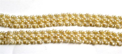Lot 97 - Two seed pearl plaited lengths and damaged drops