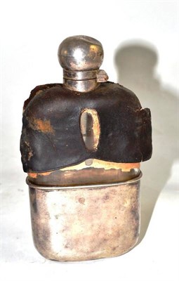 Lot 131 - A silver mounted hip flask