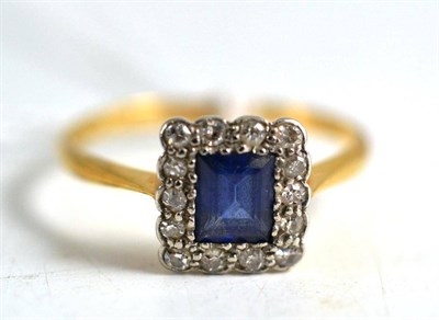 Lot 136 - A square sapphire and diamond cluster ring