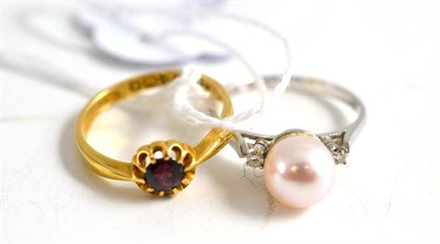 Lot 141 - Gold garnet set ring and pearl set ring