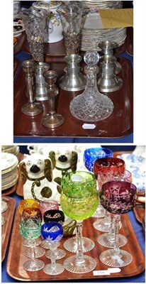 Lot 155 - Two trays of assorted coloured glasses, pair of spaniel dogs, pair of dwarf silver candlesticks and