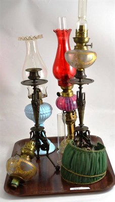 Lot 157 - Pair of decorative oil lamps, brass oil lamp/night light with pink reservoir and blue glass oil...