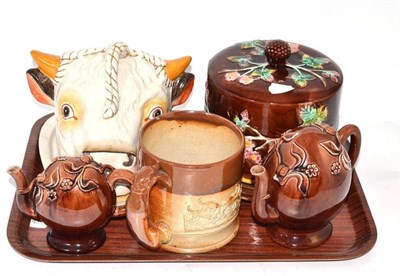 Lot 162 - A Victorian Majolica cheese dome and cover, two Cadogan teapots, large salt glazed stoneware...