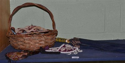 Lot 189 - Basket including Victorian beadwork wall pockets, bead panels, face screen, Wilson of Paris parasol