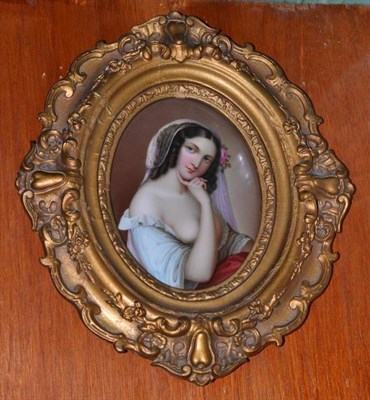 Lot 194 - A 19th century gilt framed Continental plaque depicting a semi nude maiden