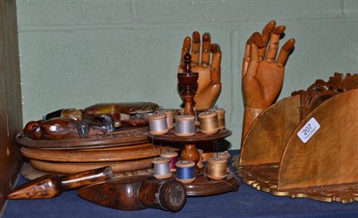 Lot 207 - Treen: pair of wooden articulated hands, four bread boards, two lead working tools, an...