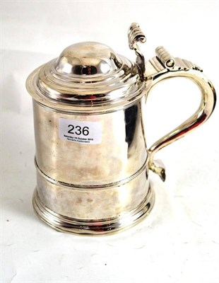 Lot 236 - A George I silver tankard, possibly Timothy Ley, London 1720, the tapering cylindrical body...