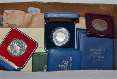 Lot 244 - A small quantity of coins, including four cased silver Royal Commemorative Crowns, a boxed Festival