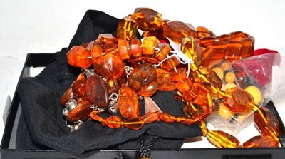 Lot 252 - Eight amber and amber type necklaces and two bracelets