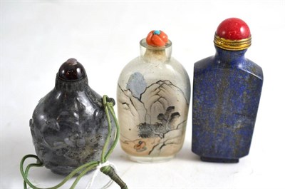 Lot 262 - A lapis lazuli snuff bottle, an interior painted snuff bottle and a green hardstone snuff...