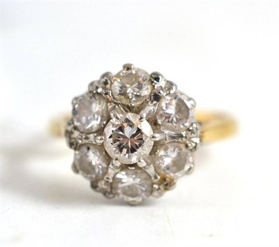 Lot 266 - A diamond cluster ring, total estimated diamond weight 1.25 carat approx, stamped '18CT' and 'PLAT'