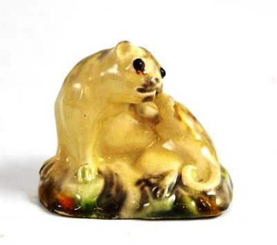 Lot 272 - A small pottery pug dog