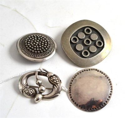 Lot 279 - Georg Jensen 77 brooch, two 925 brooches and a R Tenn Swedish brooch (4)