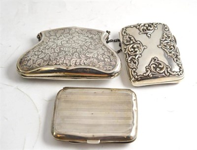 Lot 281 - An Edwardian silver purse with allover engraved decoration and two silver cigarette cases (3)