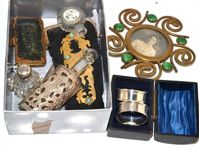 Lot 287 - Pair of silver napkin rings in a hinged domed case, glass scent bottle in pierced silver...