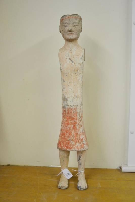 Lot 307 - A Chinese painted pottery tomb stick figure, possibly Han Dynasty, the standing male figure...