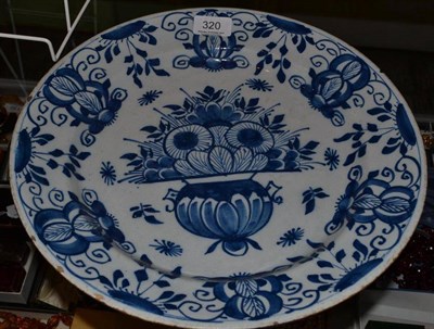 Lot 320 - A blue and white Delft charger, 34cm d