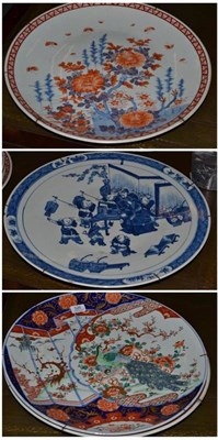 Lot 326 - Two 19th century Japanese Imari chargers and another blue and white charger (a.f.) (3)