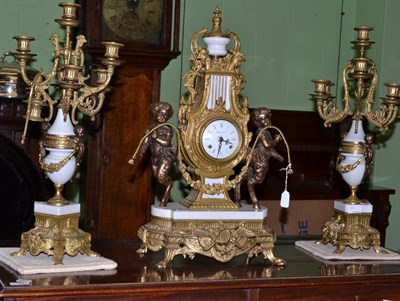 Lot 336 - Three piece clock garniture