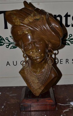 Lot 338 - James Tandi (Zimbabwe, 20th/21st century): verdite bust of a young woman, in traditional head dress