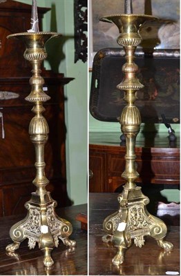 Lot 343 - Pair of brass altar candlesticks