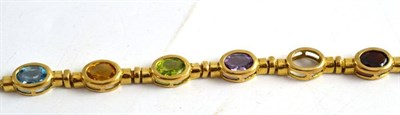 Lot 355 - A 9ct gold multi gemstone bracelet (one stone free from setting)