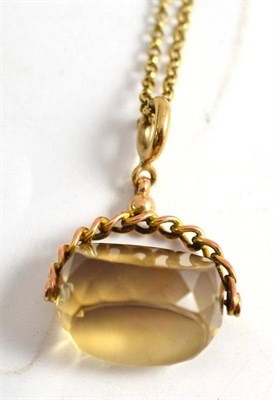 Lot 362 - A smokey quartz fob on a belcher chain